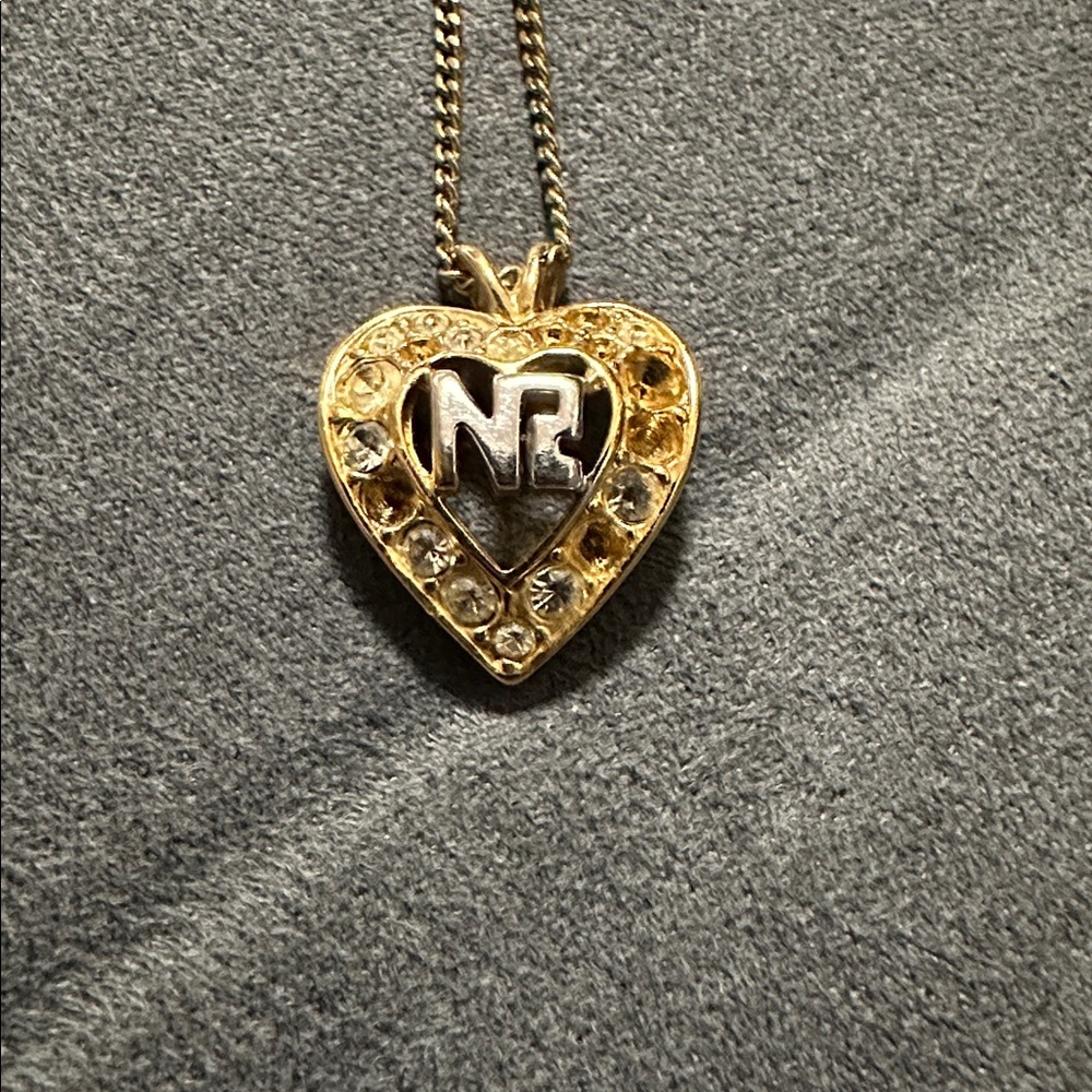Nina Ricci Gold Heart Necklace with Silver Accents PRE-OWNED.